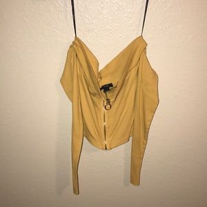 A mustard crop top